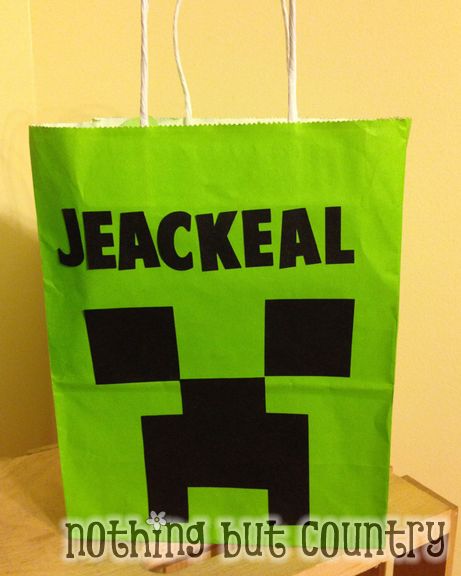 DIY Minecraft party bags using cheap black paper sacks and printed